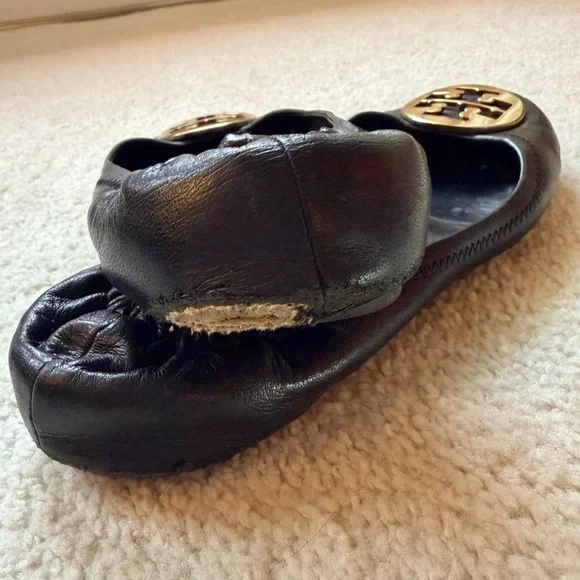 Tory Burch Black Flats with Gold Emblem - Picture 9 of 11